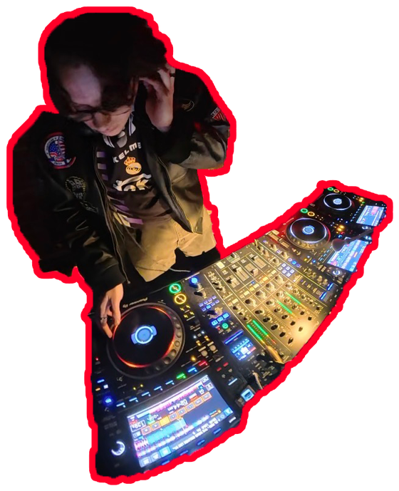 Jake DJing on a set of decks